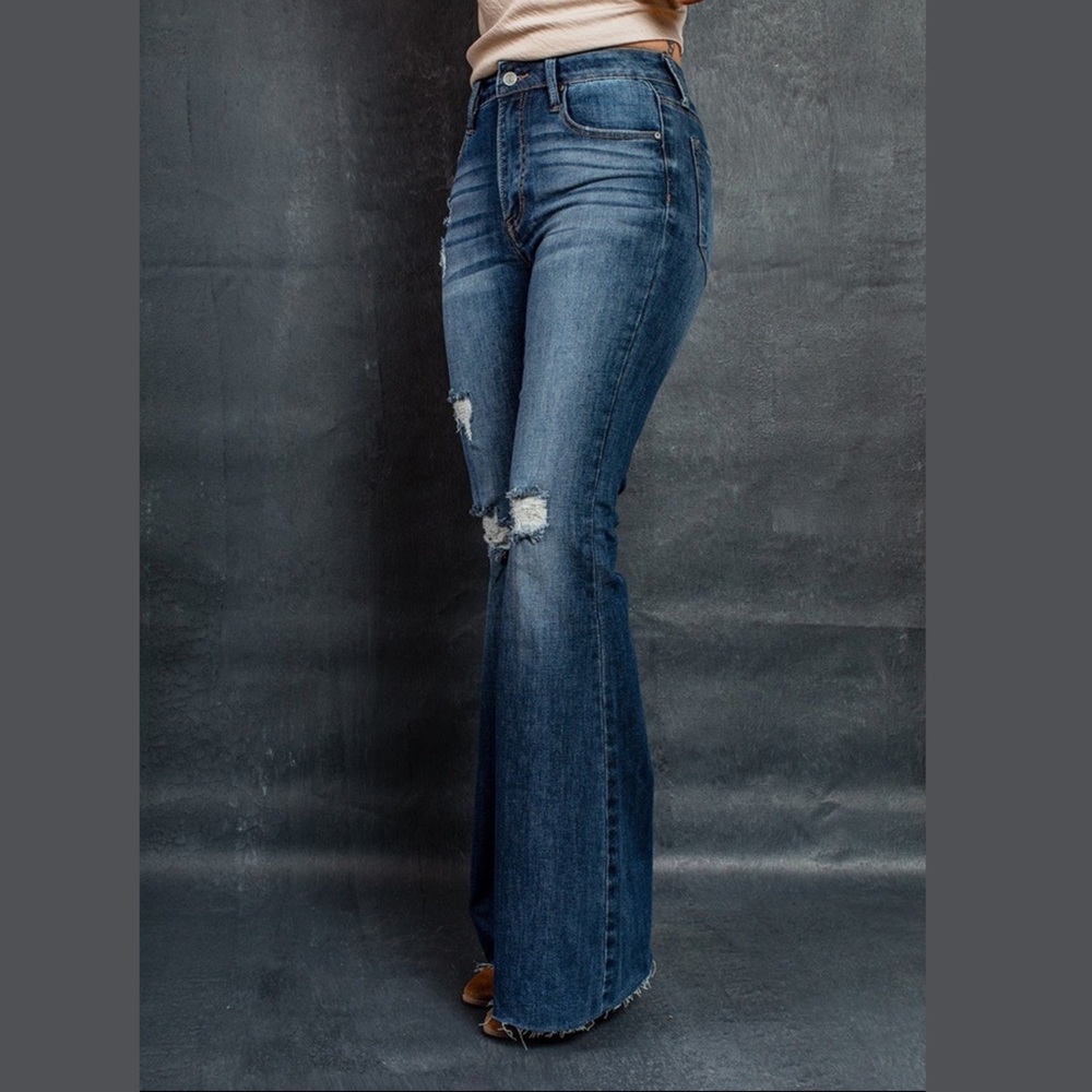 Bootcut frayed hem ripped jeans